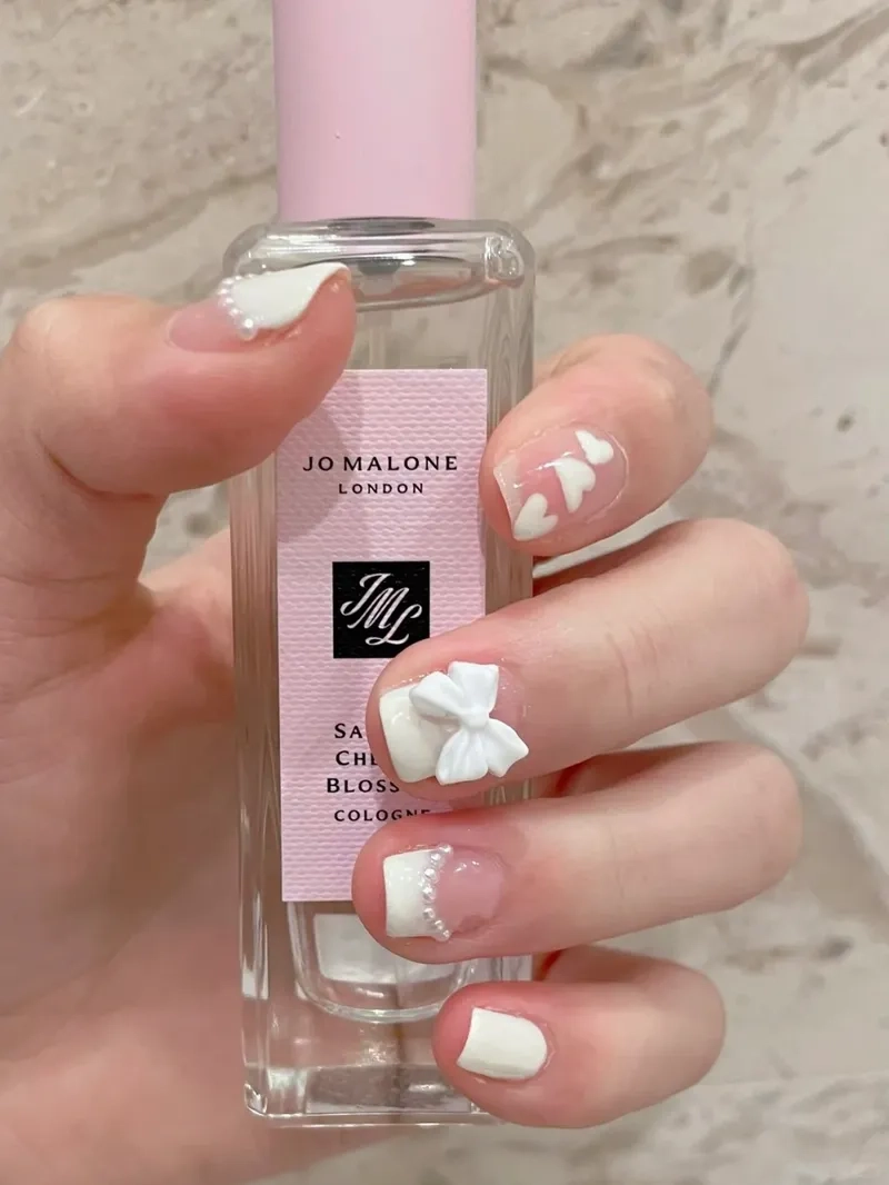 Tinh tế mỗi bước đi với mẫu nail đẹp gắn nơ